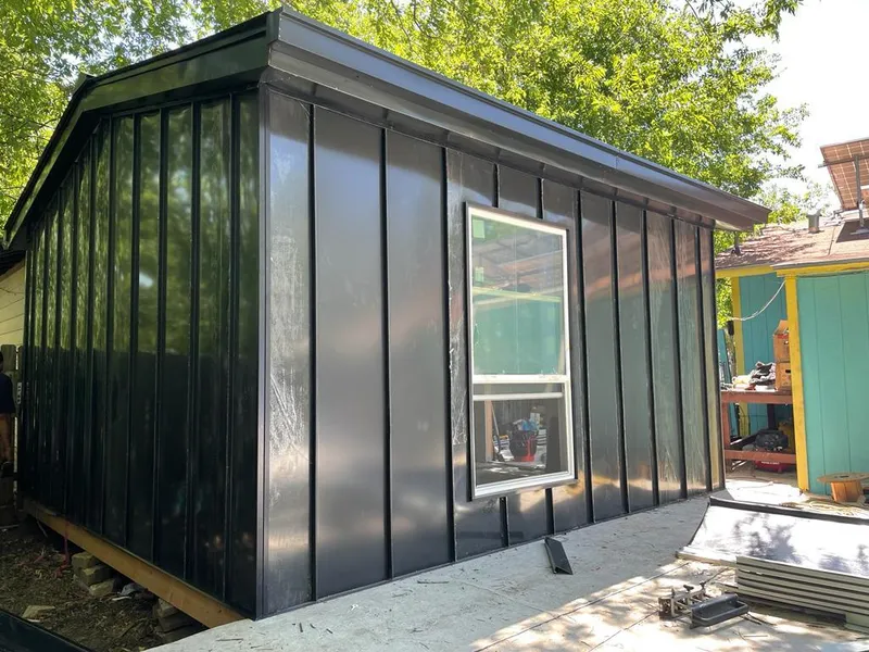 Black standing seam metal wall panels for Roof Inspection in Wildwood